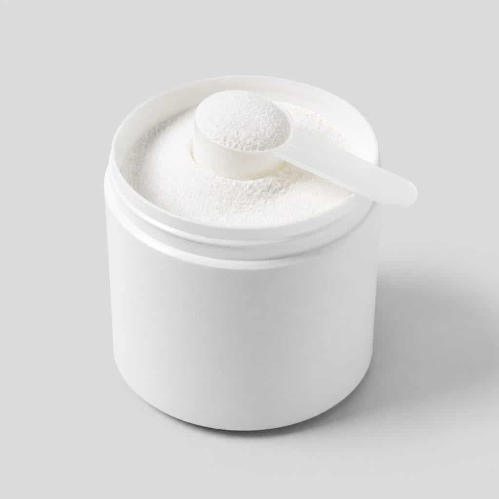 Pot de citrate de magnésium en poudre avec sa cuillère-mesure