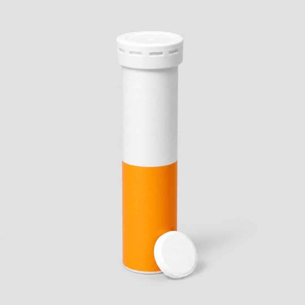 Tube de comprimés effervescents multivitamines et comprimé rond