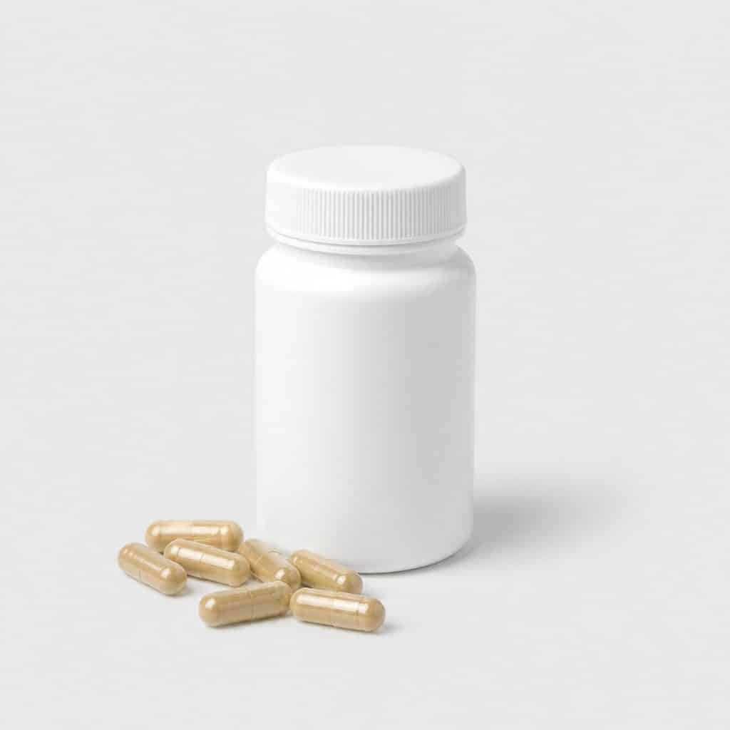 Pilulier de complément alimentaire rhodiola et mélisse en gélules